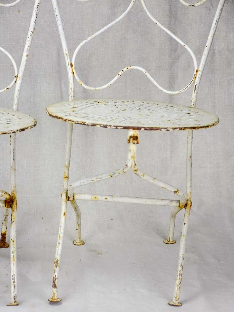 Pair of early 20th Century French children's folding garden chairs - white