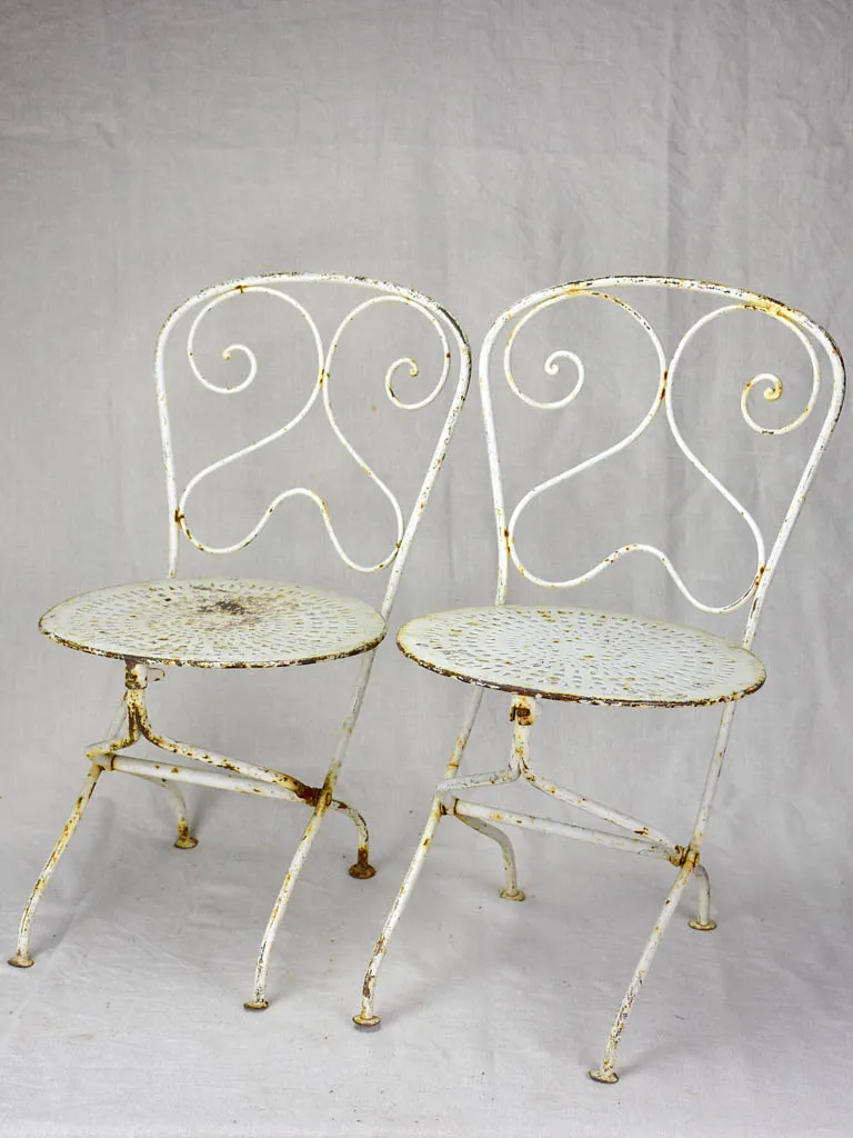 Pair of early 20th Century French children's folding garden chairs - white